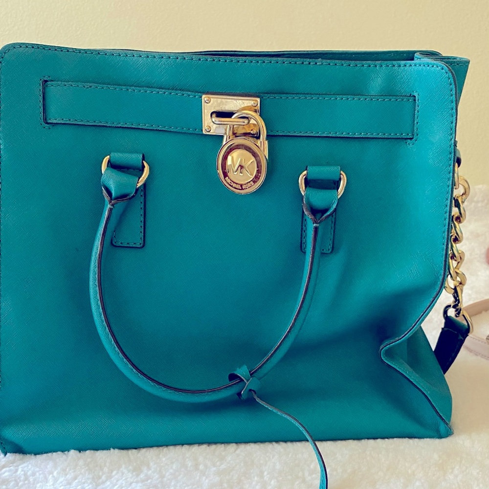 Authentic Michael kors large purse Aqua blue with beige interior and gold